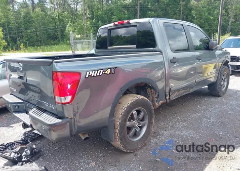 2014 Nissan Titan Pro-4X z USA, uszkodzony, nr VIN 1N6BA0EC4EN509573